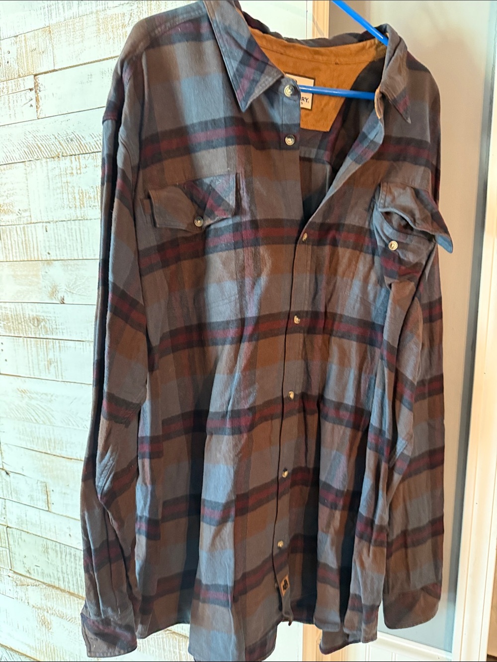 Legendary Whitetails Brown Jacket with White Label and Blue Hanger Accent